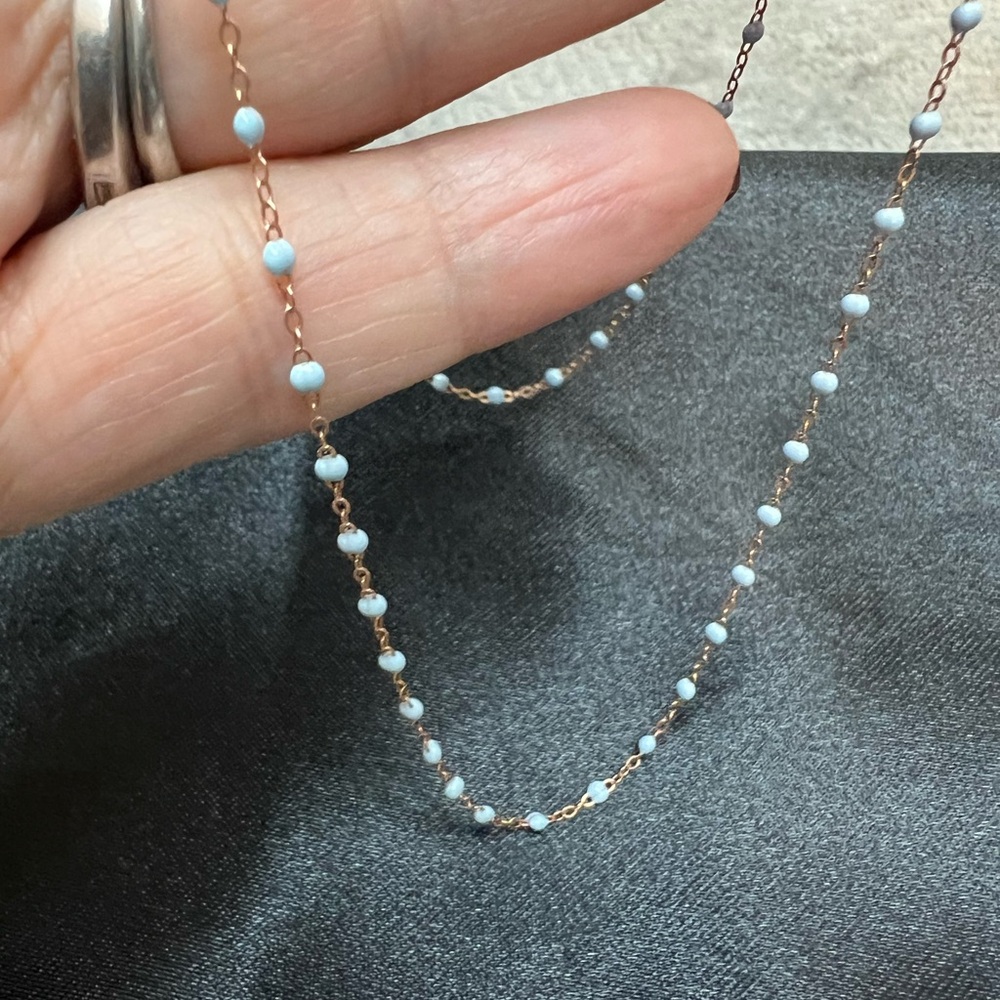 Super cute GIGI CLOZEAU 18k rose gold necklace with tiny light blue resin beads